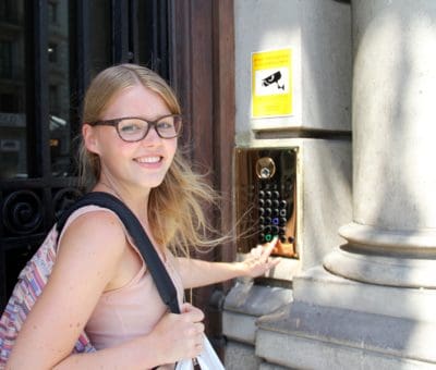 girl outside cheap hostel in barcelona