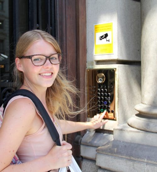 girl outside cheap hostel in barcelona