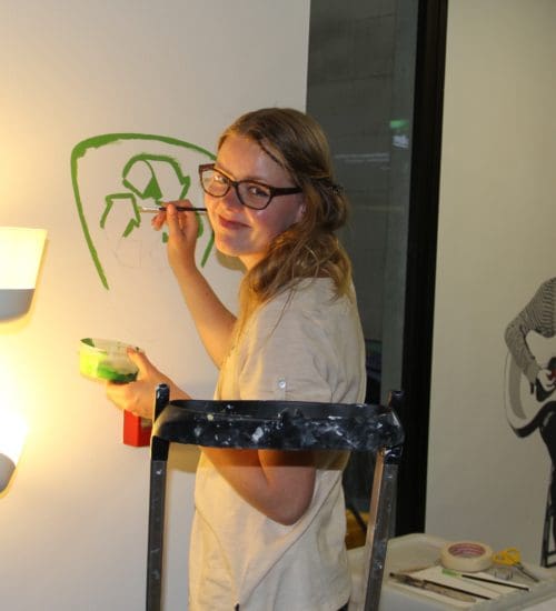 girl painting eco friendly logo acyh