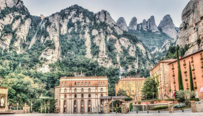 town of montserrat tucked into the mountains